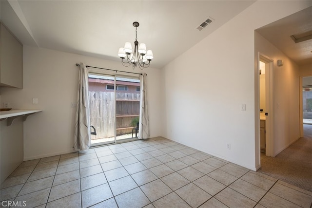 158 Colt Ln, Nipomo, CA 93444 - unfurnished dining area with a chandelier and light tile patterned flooring
