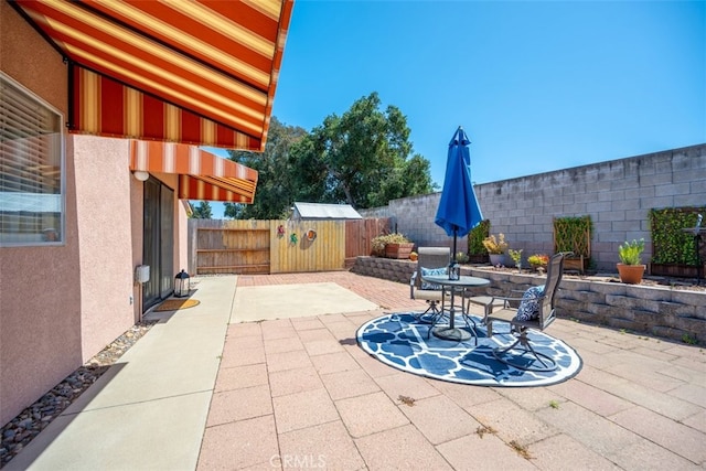 158 Colt Ln, Nipomo, CA 93444 - fenced backyard with a patio and a storage shed
