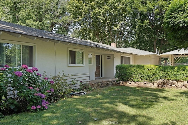 1915 Manzanita Ave, Chico, CA 95926 - single story home featuring a front yard, stucco siding, and roof with shingles