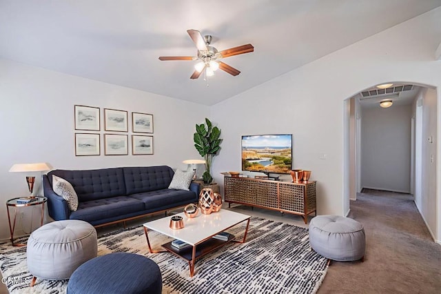 2400 Sunset Ridge Dr, Rosamond, CA 93560 - living room featuring arched walkways, a ceiling fan, lofted ceiling, and carpet flooring