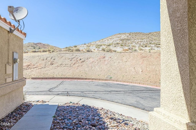 2400 Sunset Ridge Dr, Rosamond, CA 93560 - view of patio featuring a mountain view