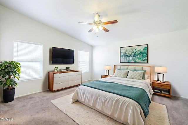 2400 Sunset Ridge Dr, Rosamond, CA 93560 - bedroom featuring light colored carpet, vaulted ceiling, and ceiling fan