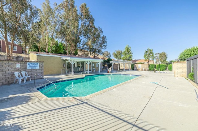 2400 Sunset Ridge Dr, Rosamond, CA 93560 - community pool featuring a patio area and a pergola
