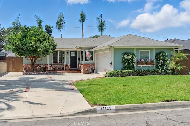 16128 Haldane St, Whittier, CA 90603 - single story home featuring concrete driveway, an attached garage, and stucco siding