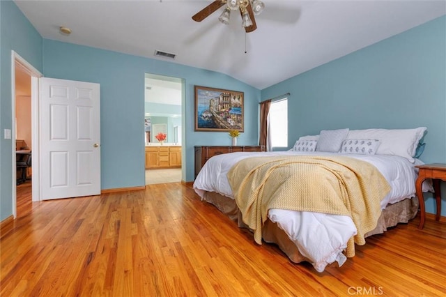 13524 Via Santa Catalina, Sylmar, CA 91342 - bedroom with light wood-type flooring, vaulted ceiling, ensuite bathroom, and ceiling fan