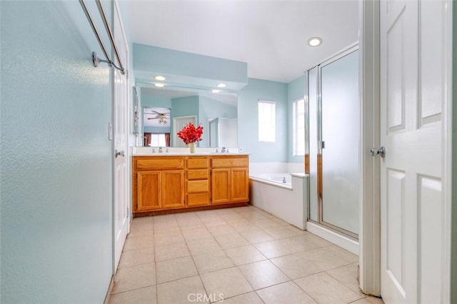 13524 Via Santa Catalina, Sylmar, CA 91342 - bathroom featuring a bath, a shower stall, double vanity, tile patterned flooring, and recessed lighting