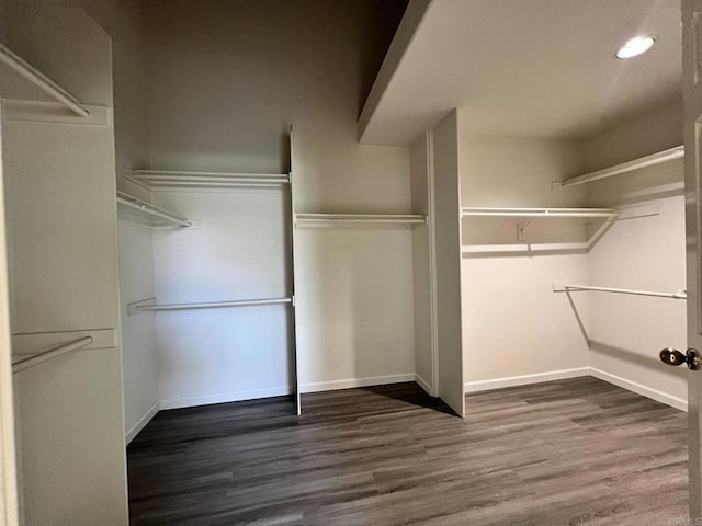 14109 Arbolitos Dr, Poway, CA 92064 - walk in closet featuring wood finished floors