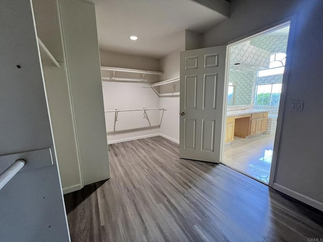 14109 Arbolitos Dr, Poway, CA 92064 - spacious closet with wood finished floors