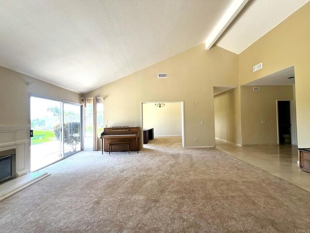 14109 Arbolitos Dr, Poway, CA 92064 - living area with high vaulted ceiling, beam ceiling, a glass covered fireplace, and carpet floors