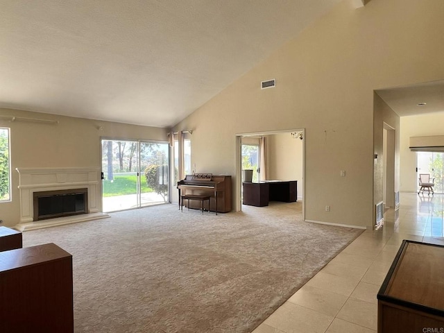 14109 Arbolitos Dr, Poway, CA 92064 - living area featuring high vaulted ceiling, light carpet, a glass covered fireplace, and light tile patterned flooring