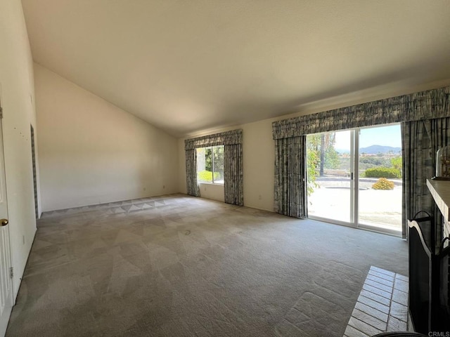 14109 Arbolitos Dr, Poway, CA 92064 - unfurnished living room featuring carpet floors and vaulted ceiling