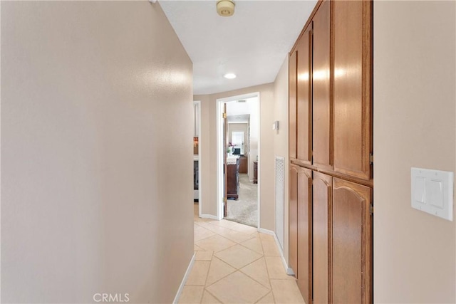 14616 Lighthouse Ln, Helendale, CA 92342 - hallway featuring light tile patterned flooring and recessed lighting