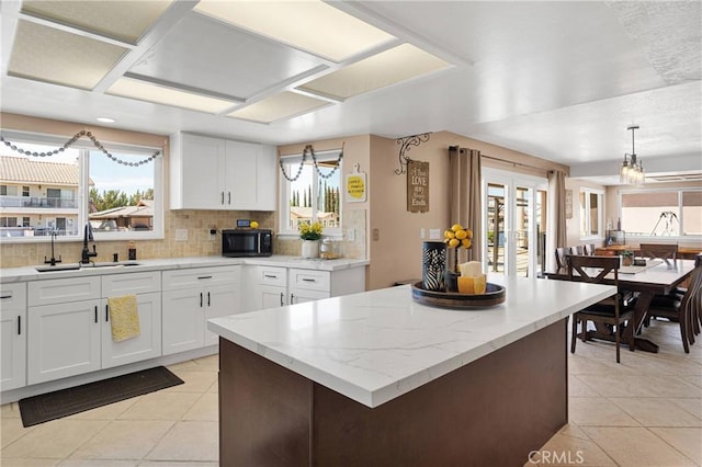 14616 Lighthouse Ln, Helendale, CA 92342 - kitchen with black microwave and healthy amount of natural light