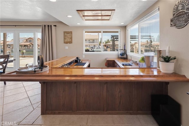 14616 Lighthouse Ln, Helendale, CA 92342 - bar with recessed lighting, a textured ceiling, and french doors
