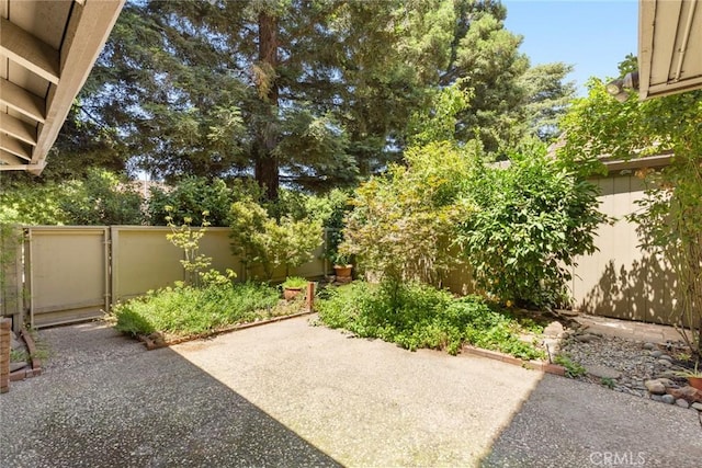 31 Pebblewood Pines Dr, Chico, CA 95926 - fenced backyard with a patio area
