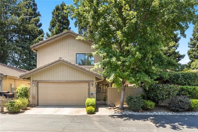 31 Pebblewood Pines Dr, Chico, CA 95926 - view of front facade with concrete driveway and an attached garage