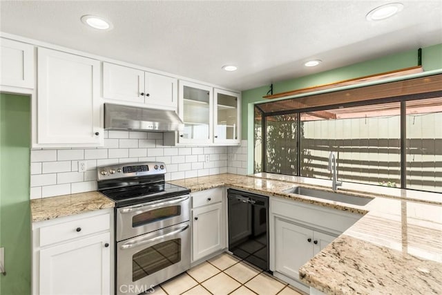 31 Pebblewood Pines Dr, Chico, CA 95926 - kitchen featuring range with two ovens, dishwasher, under cabinet range hood, white cabinetry, and backsplash