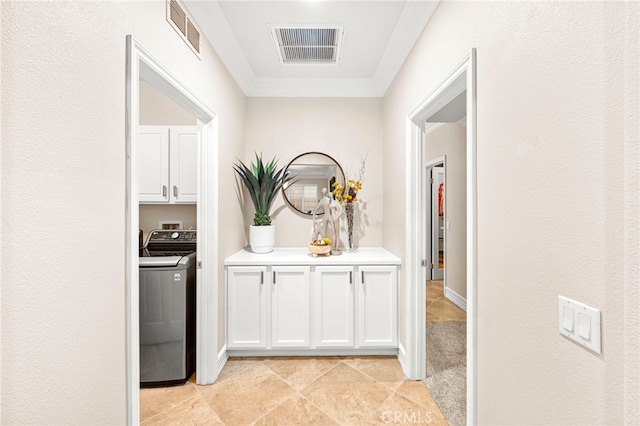 32872 Northshire Cir, Temecula, CA 92592 - corridor with washer / dryer, light tile patterned floors, and ornamental molding