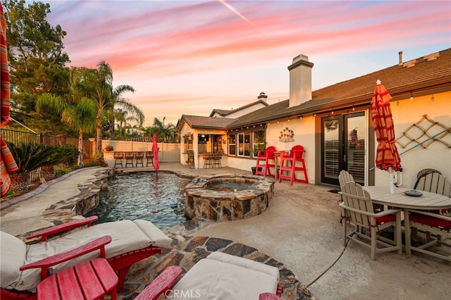 32872 Northshire Cir, Temecula, CA 92592 - view of pool with a patio, an outdoor fire pit, outdoor dining area, and a pool with connected hot tub