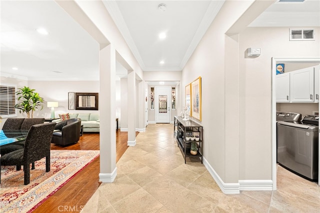 32872 Northshire Cir, Temecula, CA 92592 - corridor featuring ornamental molding, washer and dryer, and recessed lighting