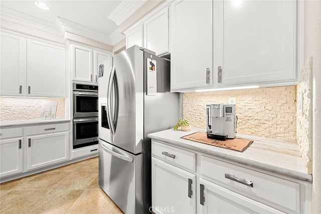 32872 Northshire Cir, Temecula, CA 92592 - kitchen featuring stainless steel appliances, ornamental molding, decorative backsplash, and white cabinetry