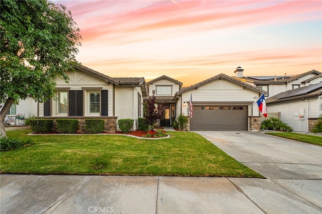 32872 Northshire Cir, Temecula, CA 92592 - view of front of property featuring concrete driveway, an attached garage, a front yard, and stone siding