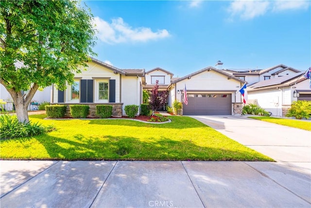 32872 Northshire Cir, Temecula, CA 92592 - view of front of home featuring an attached garage, concrete driveway, a front lawn, and stone siding