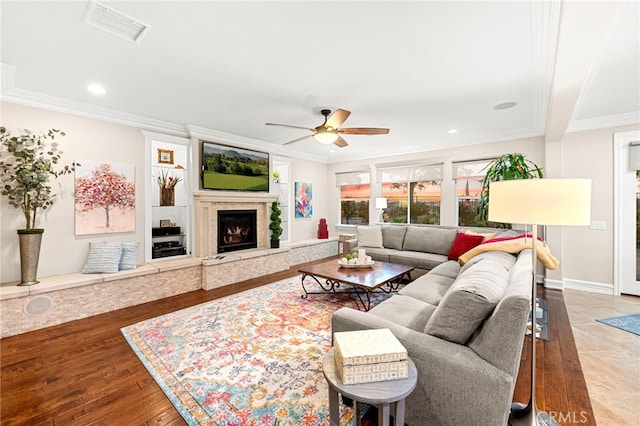 32872 Northshire Cir, Temecula, CA 92592 - living room with a ceiling fan, crown molding, recessed lighting, and a premium fireplace