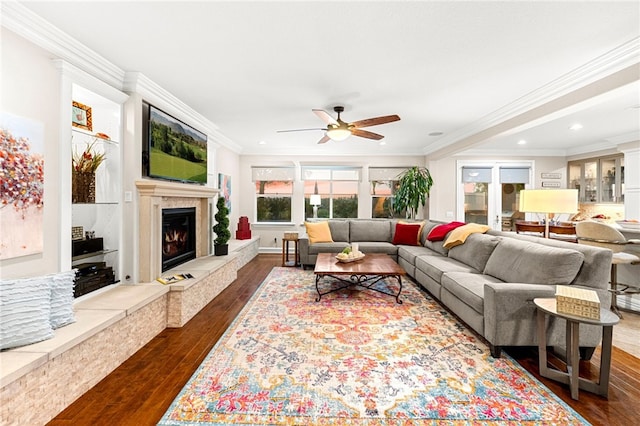 32872 Northshire Cir, Temecula, CA 92592 - living area with dark wood finished floors, ceiling fan, ornamental molding, a lit fireplace, and recessed lighting