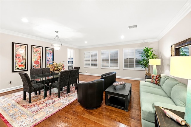 32872 Northshire Cir, Temecula, CA 92592 - living area featuring wood finished floors, ornamental molding, and recessed lighting