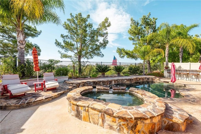 32872 Northshire Cir, Temecula, CA 92592 - view of pool with a patio area, a fenced backyard, and a pool with connected hot tub