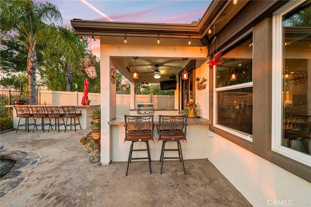 32872 Northshire Cir, Temecula, CA 92592 - patio terrace at dusk featuring a grill and a patio