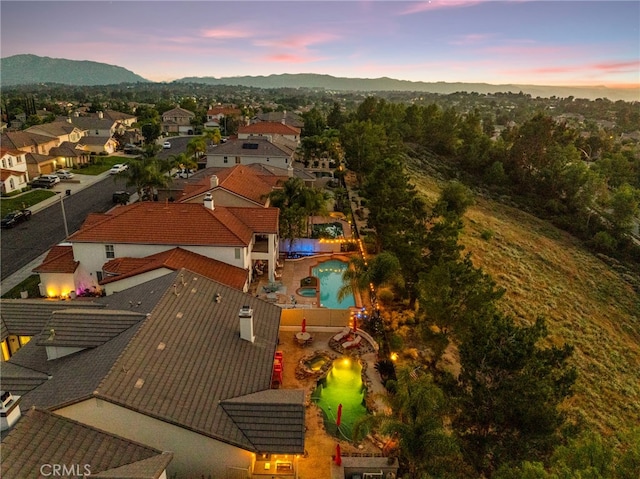 32872 Northshire Cir, Temecula, CA 92592 - aerial view at dusk of a mountain view and a residential view