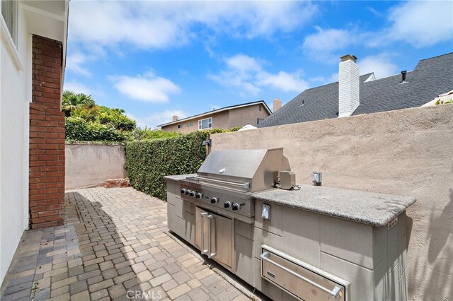 2030 Goldeneye Pl, Costa Mesa, CA 92626 - fenced backyard featuring area for grilling and a patio