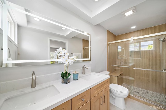 2030 Goldeneye Pl, Costa Mesa, CA 92626 - bathroom with double vanity, a stall shower, a raised ceiling, and recessed lighting