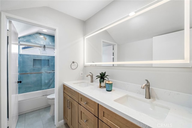 2030 Goldeneye Pl, Costa Mesa, CA 92626 - bathroom featuring vaulted ceiling, double vanity, shower / bath combination, and tile patterned flooring