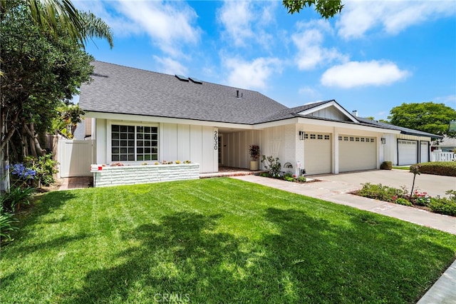2030 Goldeneye Pl, Costa Mesa, CA 92626 - view of front of property featuring a garage, roof with shingles, driveway, and board and batten siding