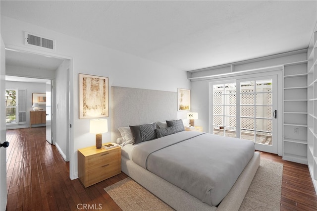 2030 Goldeneye Pl, Costa Mesa, CA 92626 - bedroom featuring access to exterior and dark wood-style floors