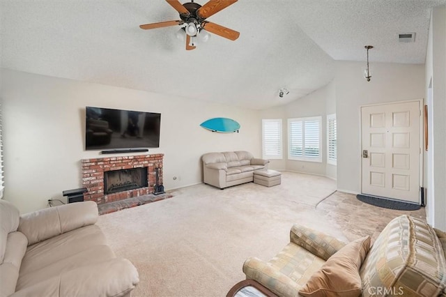 15144 Poppy Meadow St, Canyon Country, CA 91387 - living room featuring ceiling fan, lofted ceiling, carpet flooring, a fireplace, and a textured ceiling