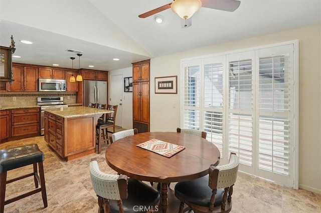 15144 Poppy Meadow St, Canyon Country, CA 91387 - dining area featuring a ceiling fan, lofted ceiling, and recessed lighting