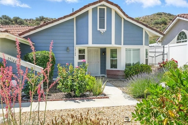15144 Poppy Meadow St, Canyon Country, CA 91387 - view of front facade with a tiled roof