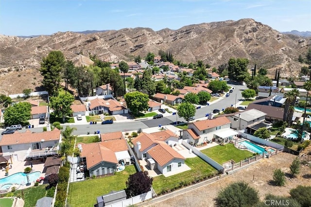 15144 Poppy Meadow St, Canyon Country, CA 91387 - aerial view of property and surrounding area with nearby suburban area and a mountain backdrop