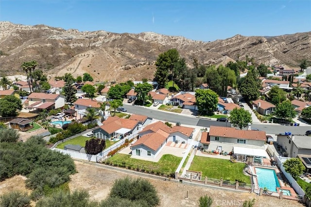 15144 Poppy Meadow St, Canyon Country, CA 91387 - aerial perspective of suburban area with a pool and a mountain backdrop