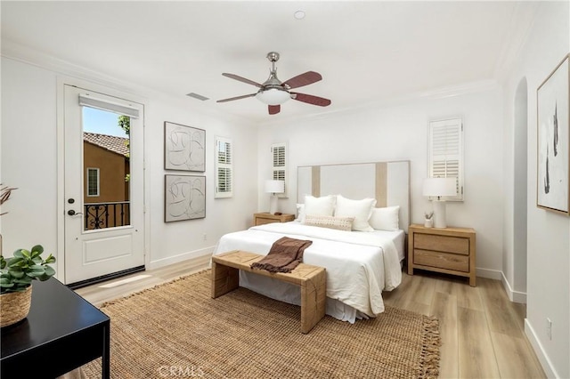 74 Townsend, Irvine, CA 92620 - bedroom with light wood-type flooring, crown molding, ceiling fan, and arched walkways