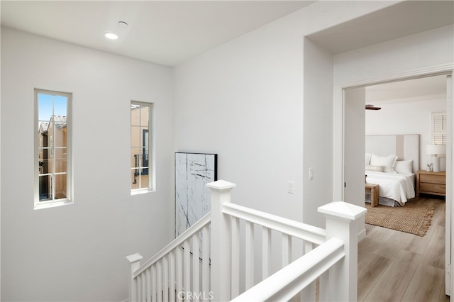 74 Townsend, Irvine, CA 92620 - hallway with an upstairs landing and light wood-style flooring