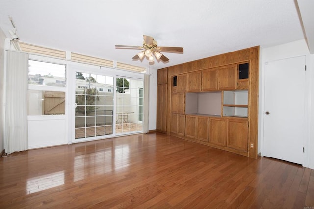 3621 Vista Campana S Unit 11, Oceanside, CA 92057 - unfurnished living room featuring ceiling fan and wood finished floors