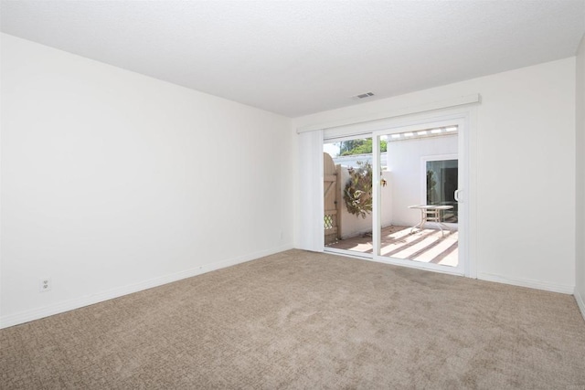 3621 Vista Campana S Unit 11, Oceanside, CA 92057 - spare room with carpet floors and baseboards