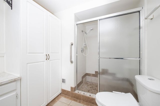 3621 Vista Campana S Unit 11, Oceanside, CA 92057 - full bath featuring a stall shower, tile patterned flooring, and vanity