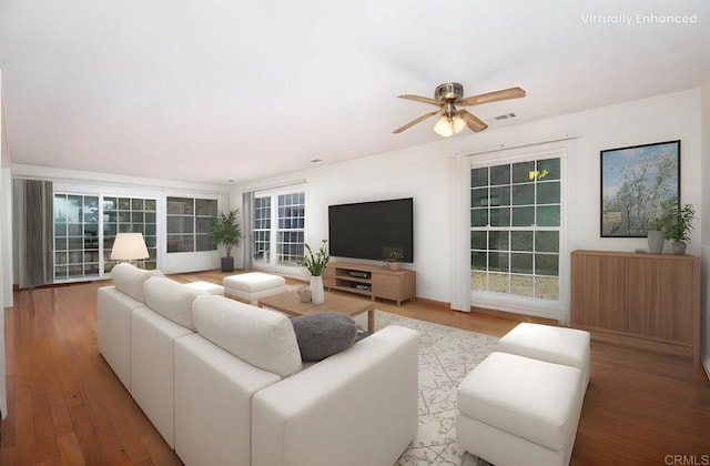 3621 Vista Campana S Unit 11, Oceanside, CA 92057 - living room featuring ceiling fan and wood finished floors