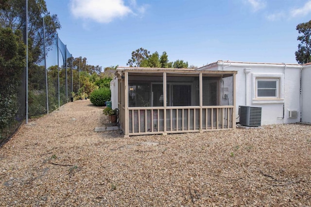 3621 Vista Campana S Unit 11, Oceanside, CA 92057 - rear view of property with a sunroom and stucco siding